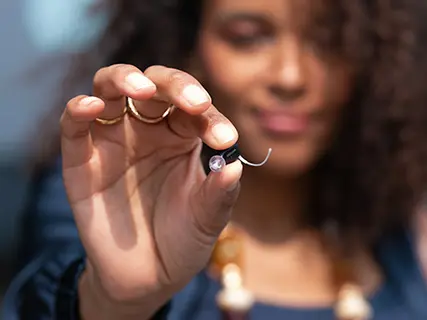 Modern Hearing Aids Don’t Look (Or Feel) Like Your Grandparents’ Devices